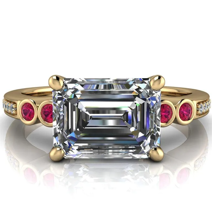 Fire Brilliance Rings Philippa Emerald Moissanite 4 Ruby Sides 4 Prong Under Bezel Multi Stone Engagement Ring