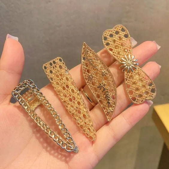 H691 Gold Decorated Leaf Hair Clip 01 Earrings